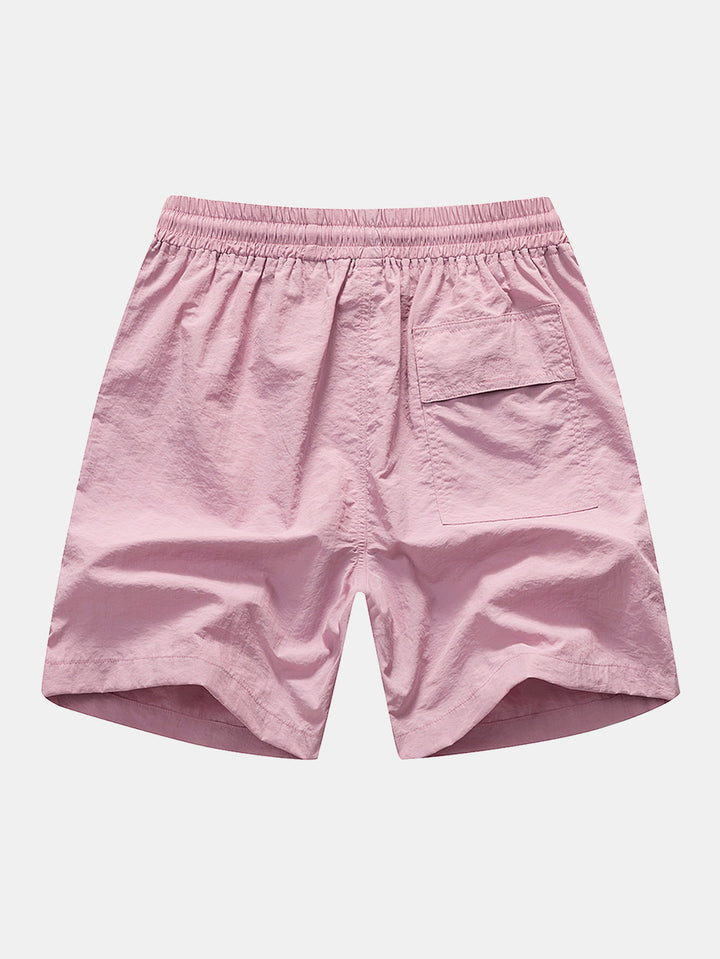CONJUNTO Camisa de botones  y pantalones cortos de baño