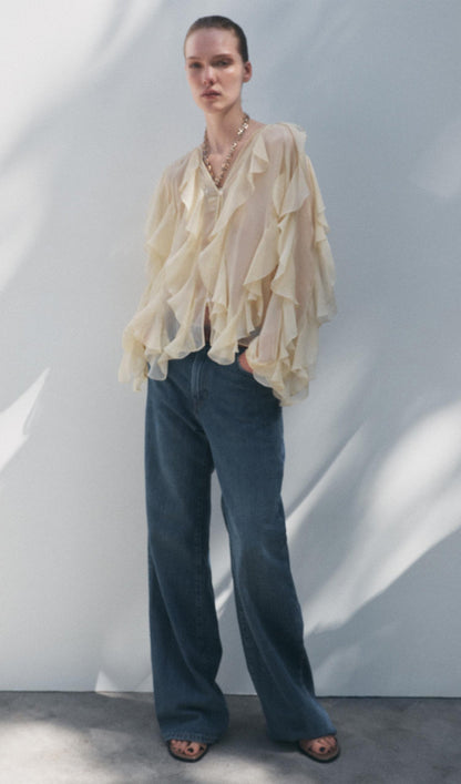 BLUSA CON VOLANTES