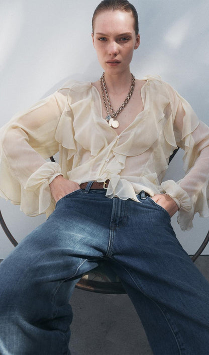 BLUSA CON VOLANTES