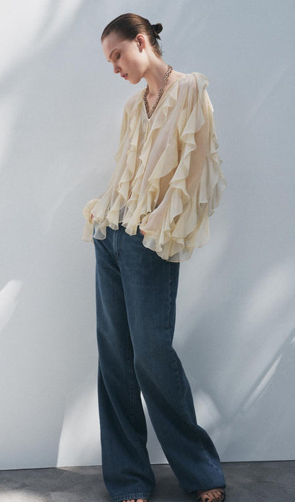 BLUSA CON VOLANTES