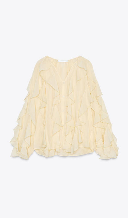BLUSA CON VOLANTES