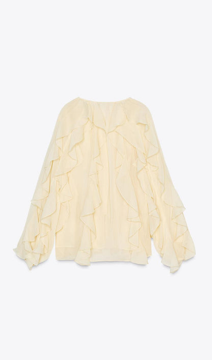 BLUSA CON VOLANTES
