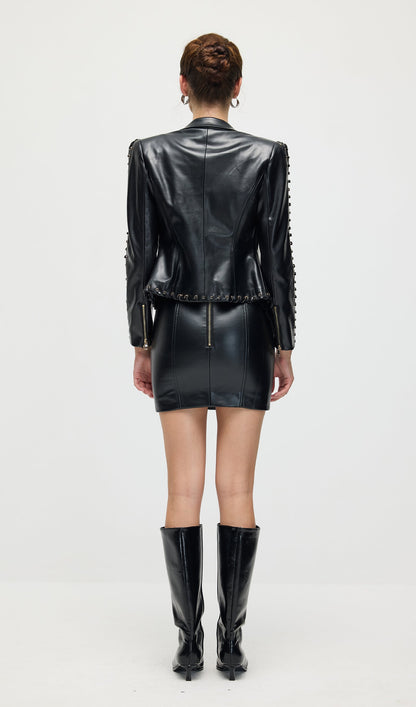 CONJUNTO CHAQUETA Y MINIFALDA DE CUERO