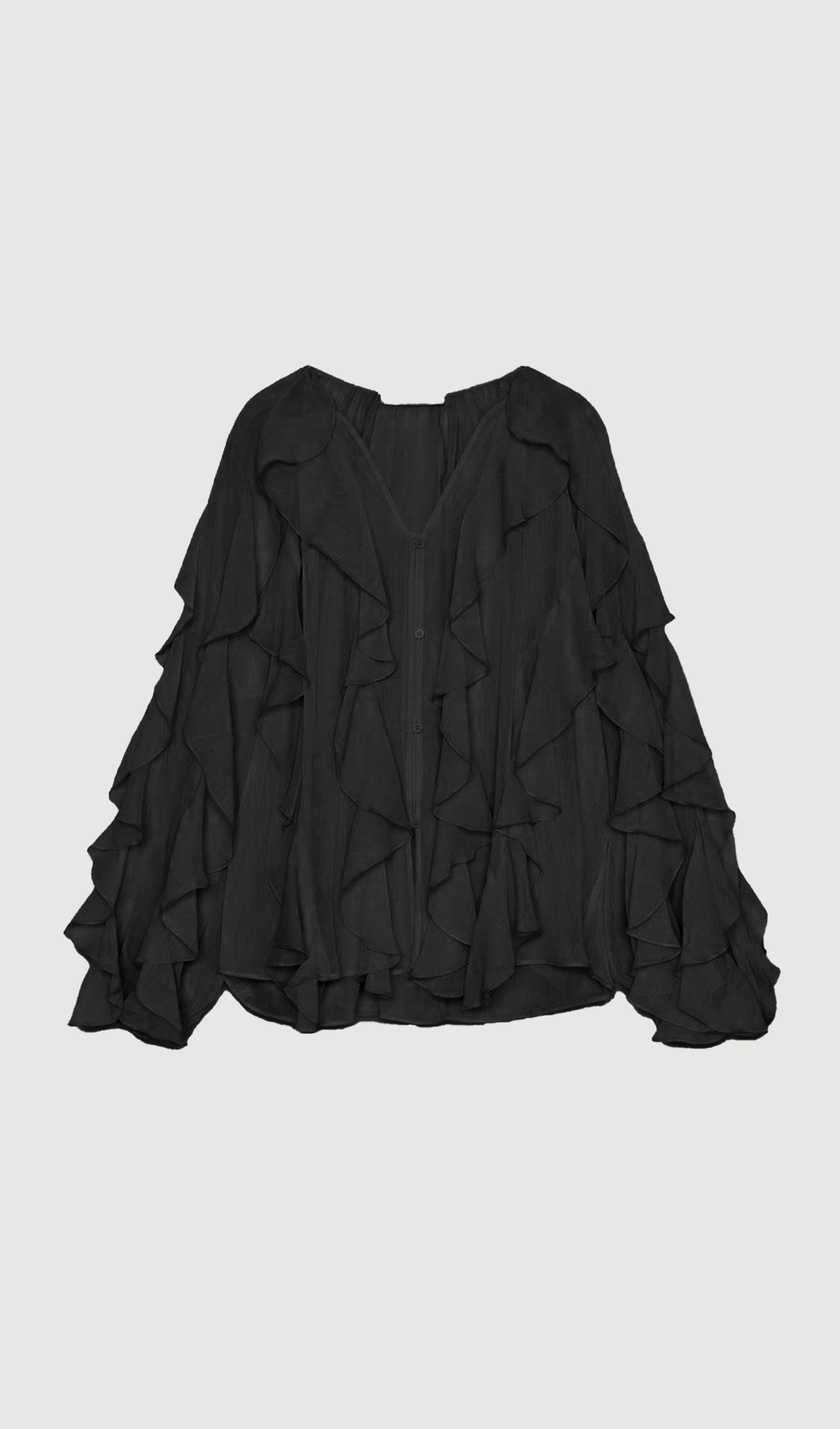 BLUSA CON VOLANTES