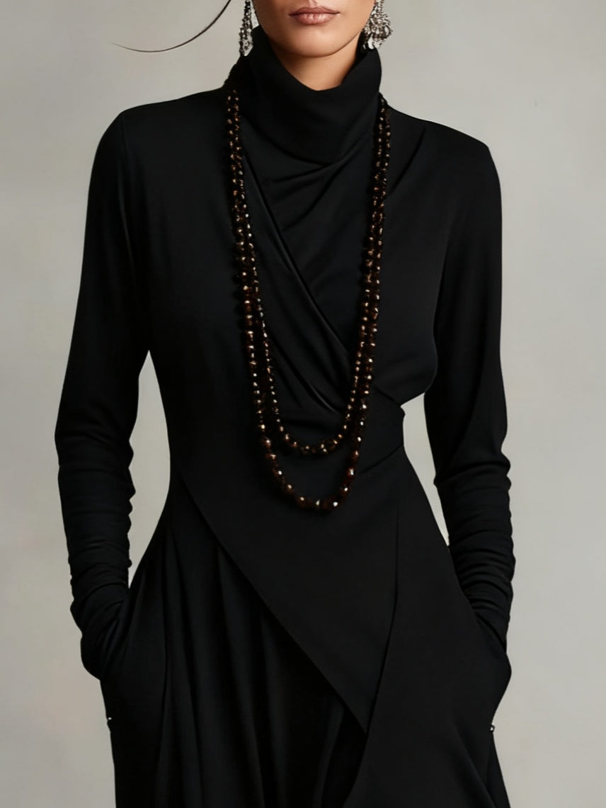 VESTIDO MAXI PLISADO ASIMÉTRICO DE CUELLO ALTO AURELIA