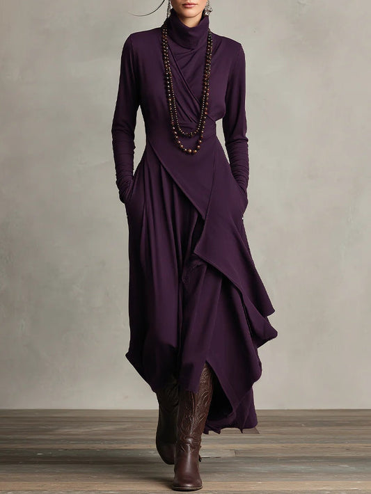 VESTIDO MAXI PLISADO ASIMÉTRICO DE CUELLO ALTO AURELIA