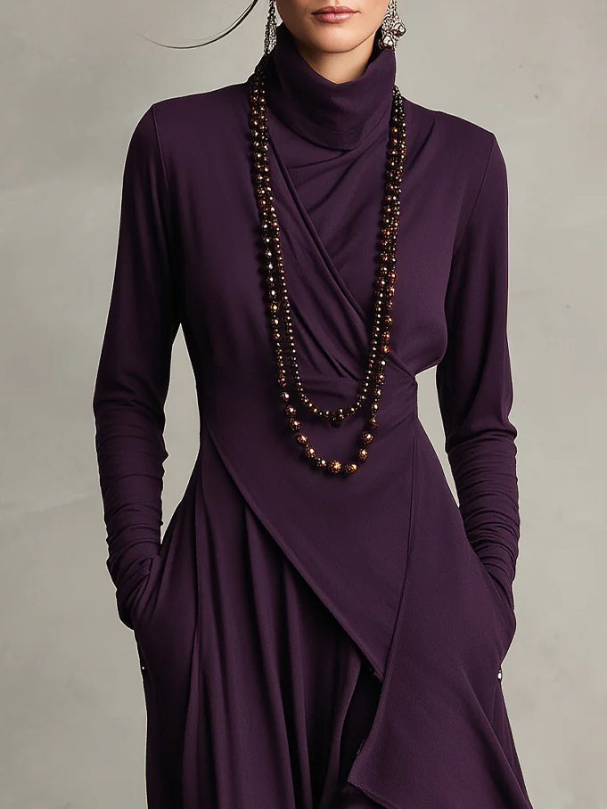 VESTIDO MAXI PLISADO ASIMÉTRICO DE CUELLO ALTO AURELIA