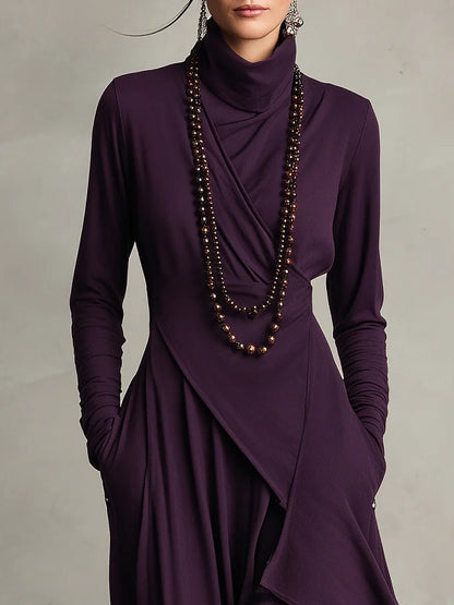 VESTIDO MAXI PLISADO ASIMÉTRICO DE CUELLO ALTO AURELIA